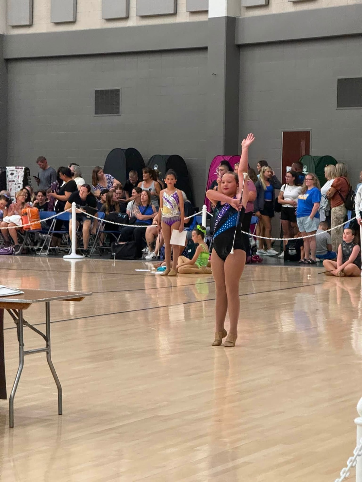 Captivators twirler competing on the floor
